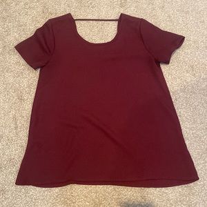 Burgundy top, could fit size small or medium